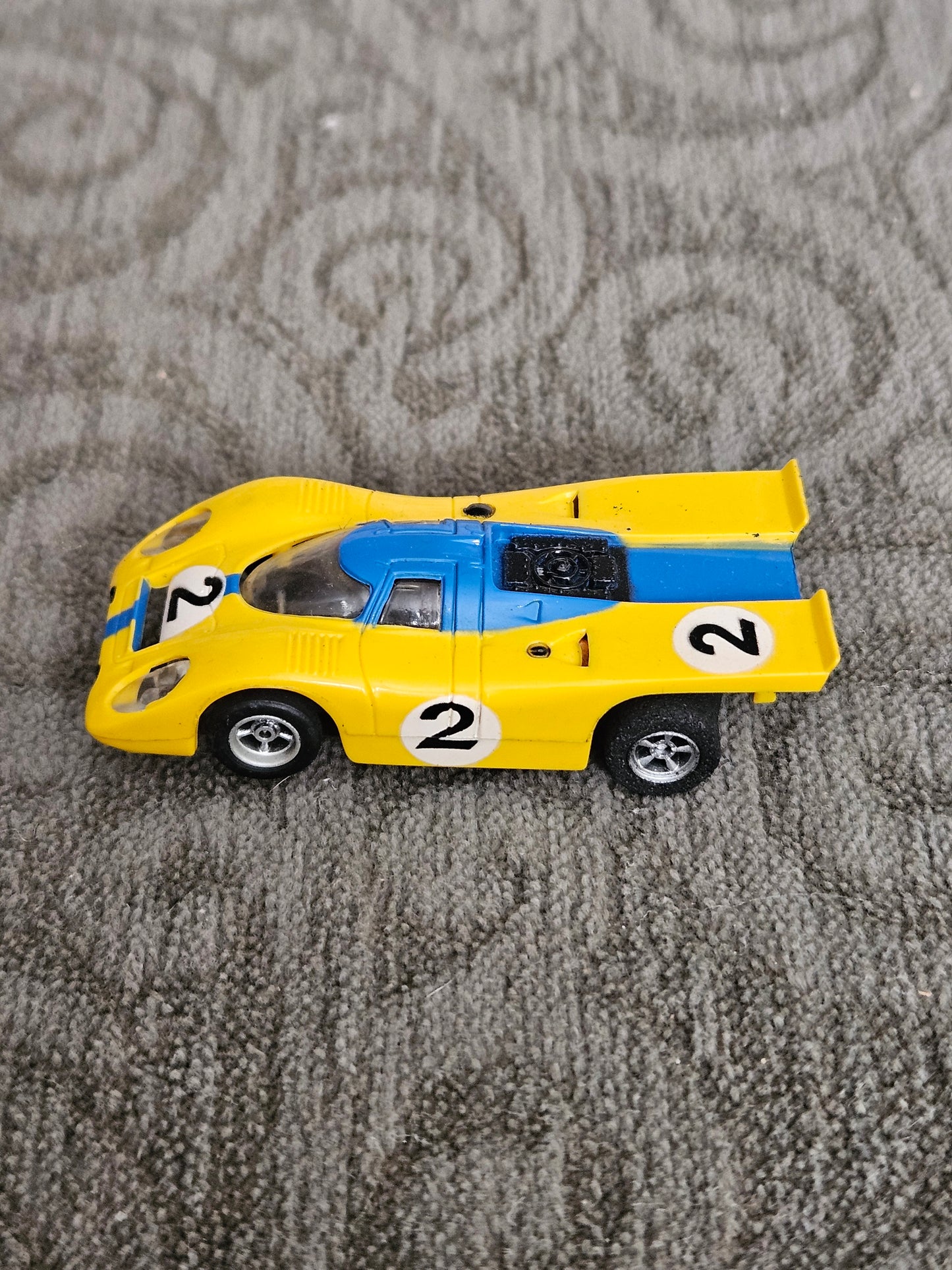 Vintage Aurora AFX Porsche Yellow/Blue #2 HO SLOT CAR
