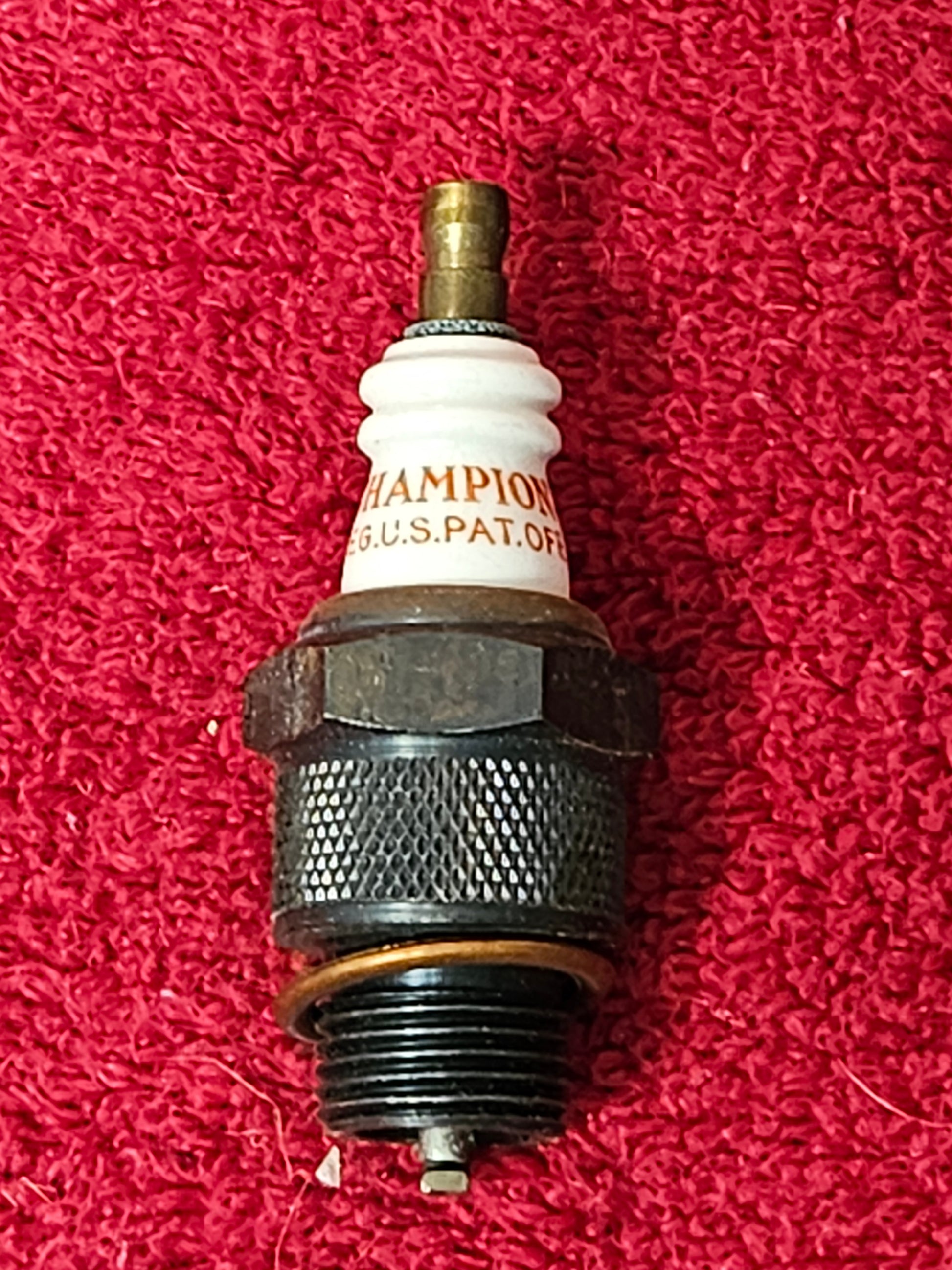 Champion 6 Com spark plug close-up 18mm