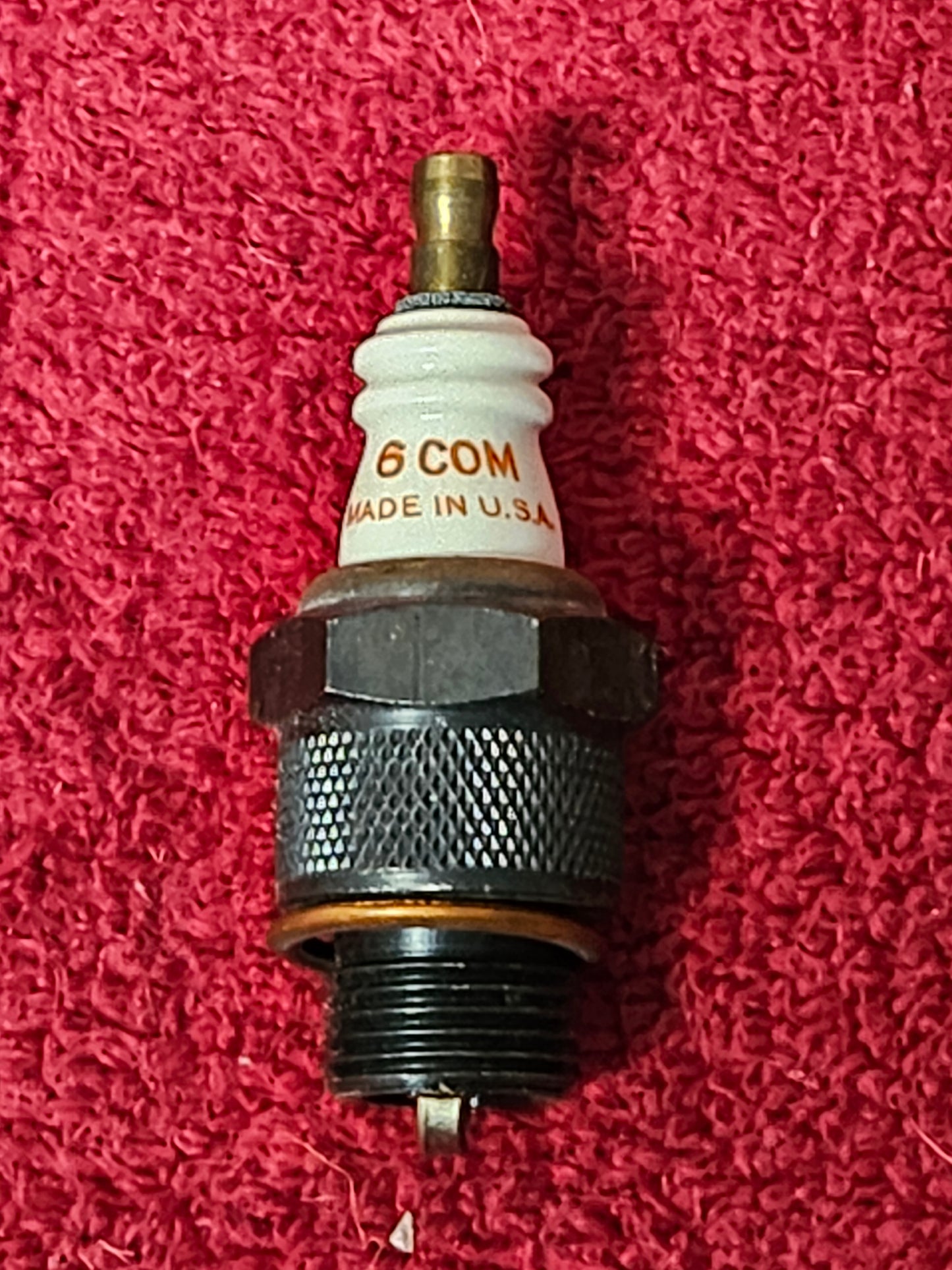 Champion 6 Com spark plug detail
