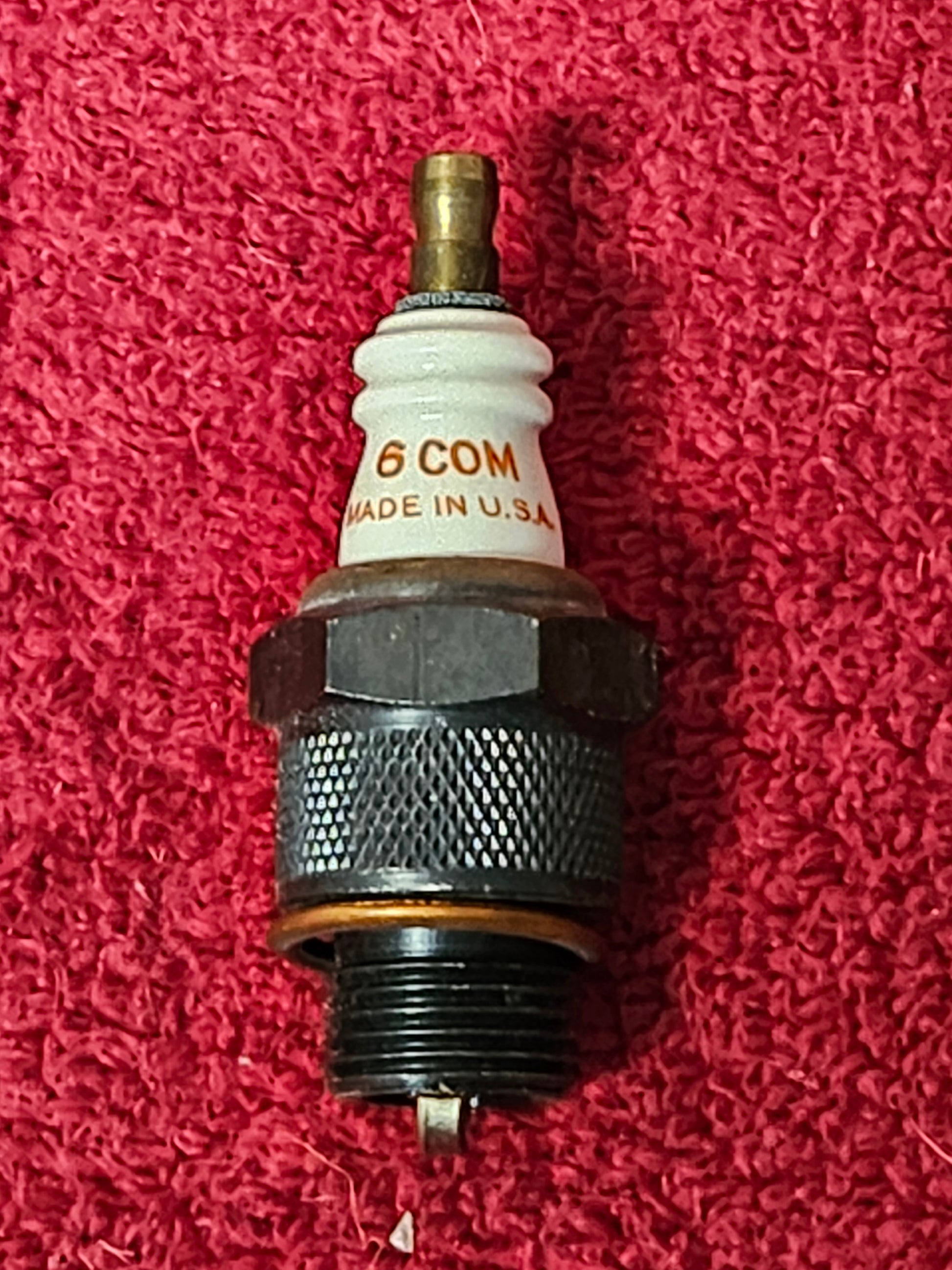 Champion 6 Com spark plug detail