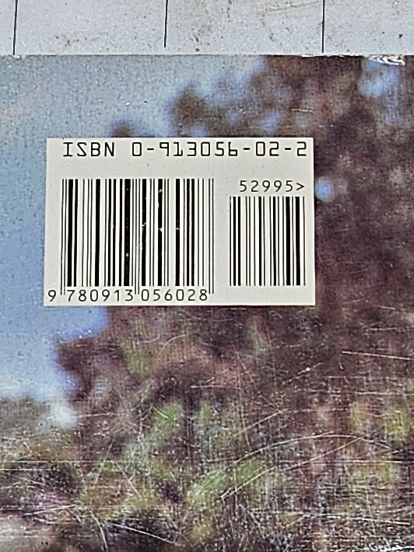 Close up of ISBN 0-913056-02-2 barcode
