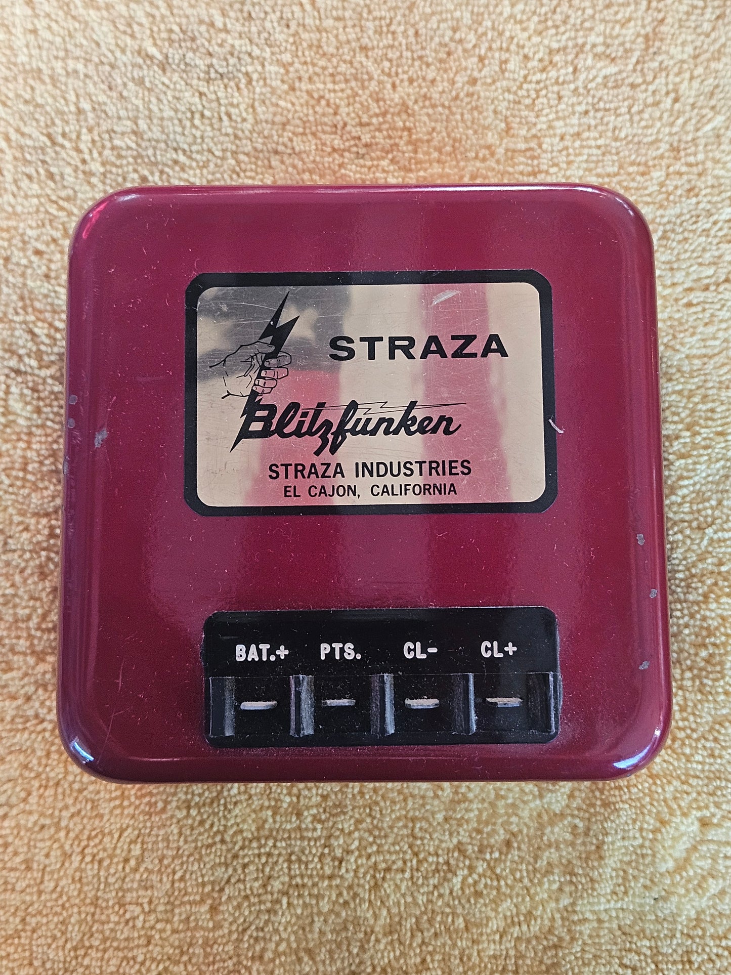 Straza Blitzfunken Model 12N2 capacitive discharge ignition, maroon housing with fist and lightning bolt label