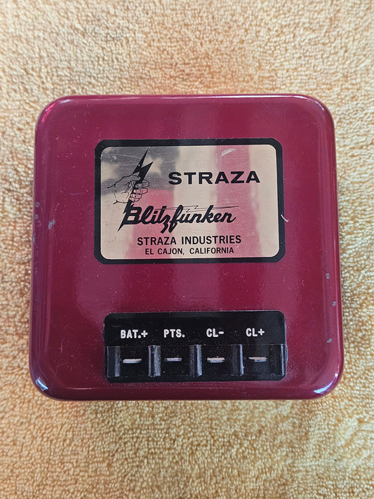 Straza Blitzfunken Model 12N2 capacitive discharge ignition, maroon housing with fist and lightning bolt label