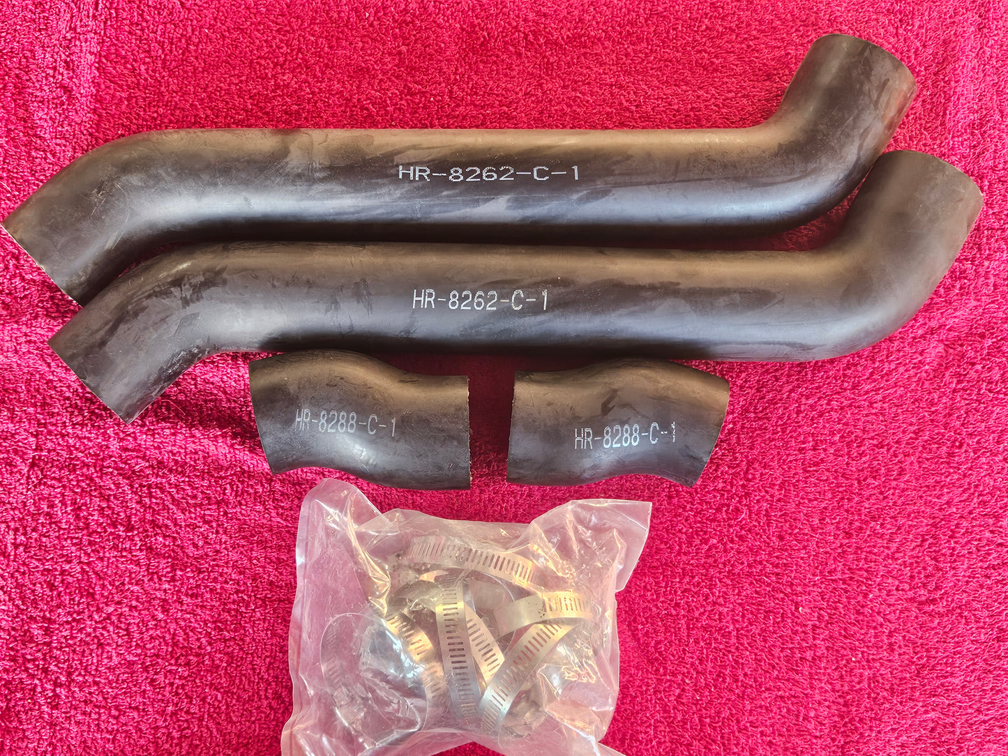 Bob Drake radiator hose kit for 1935-36 Ford with 37-48 flathead, four molded hoses and bag of stainless Ford script clamps
