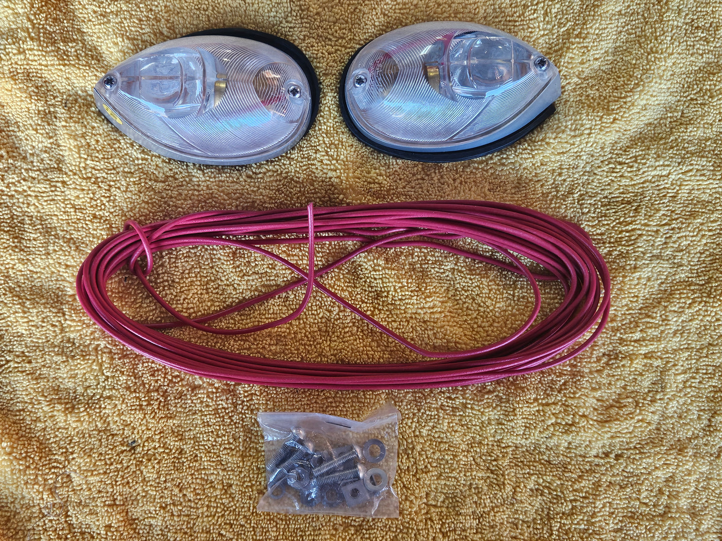 Signal-Stat Kit C 9W-6V contents: pair of No. 9 lamps, coil of wire and mounting hardware