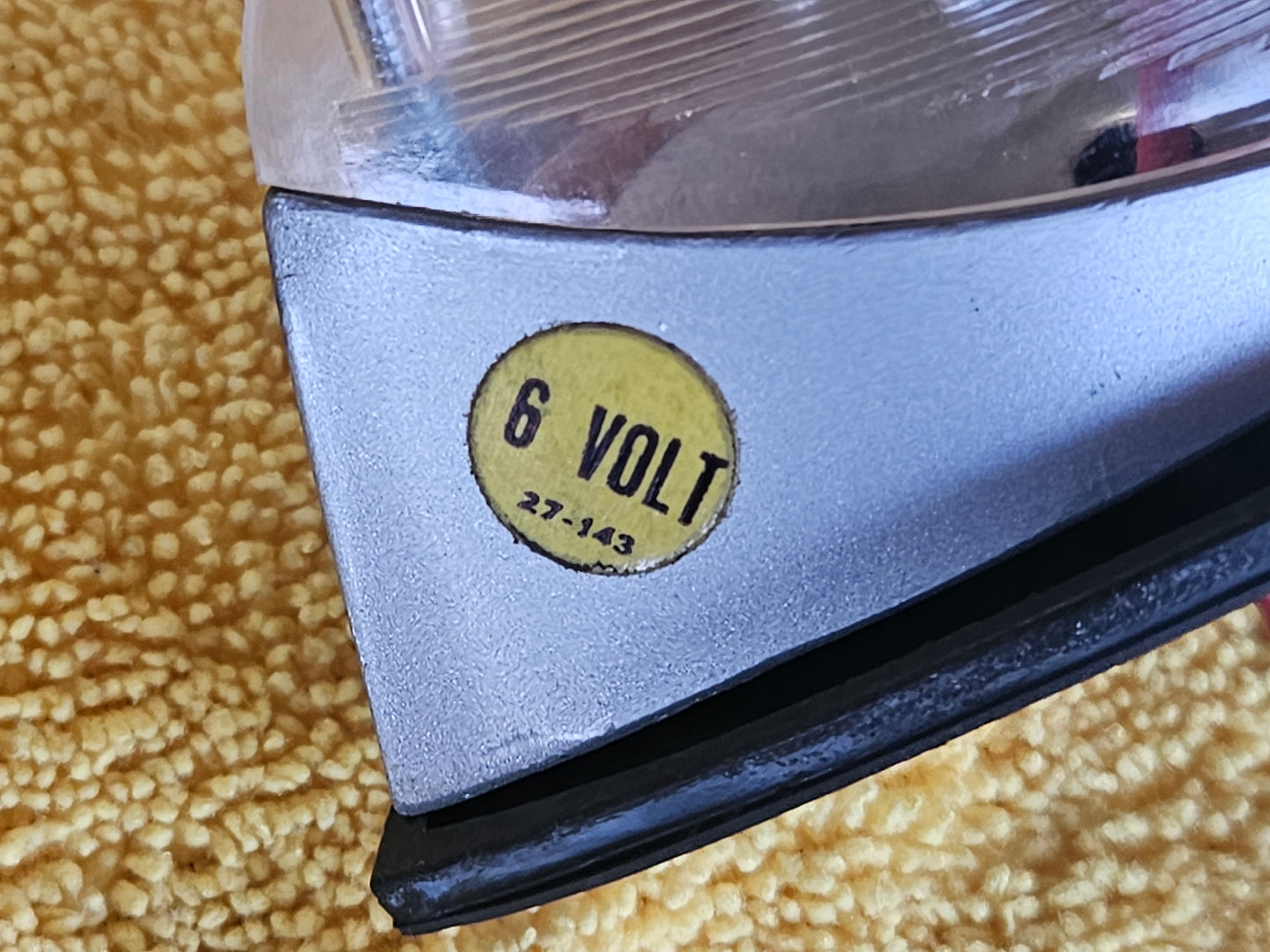 Yellow 6 VOLT 27-143 sticker on the Signal-Stat lamp base