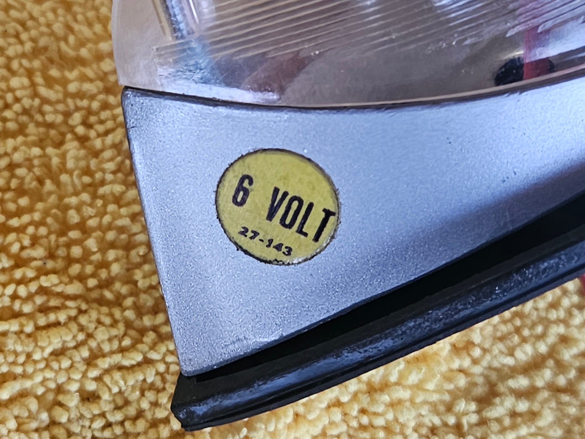 Yellow 6 VOLT 27-143 sticker on the Signal-Stat lamp base
