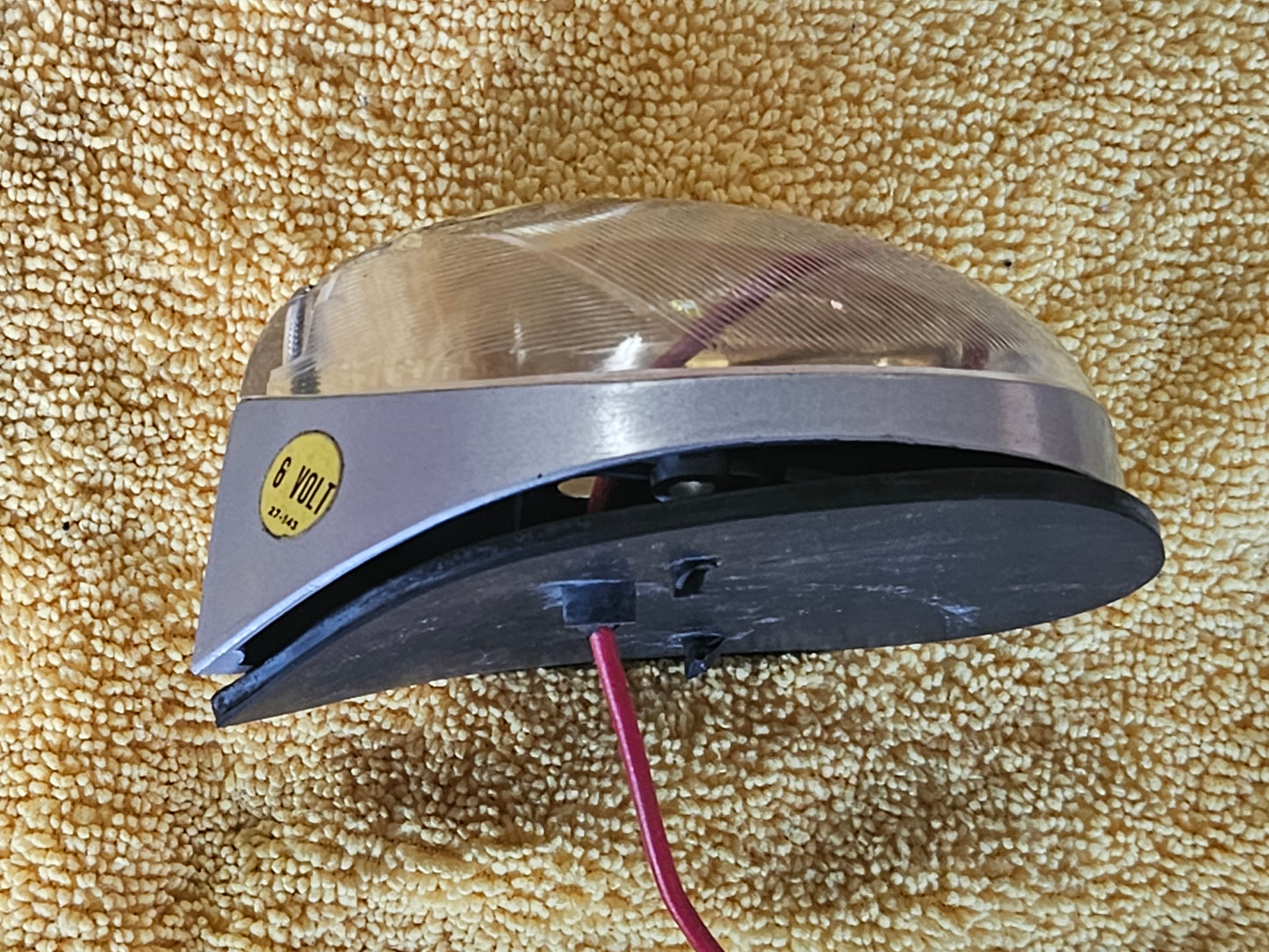 Side profile of Signal-Stat No. 9 lamp with clear lens and rubber gasket