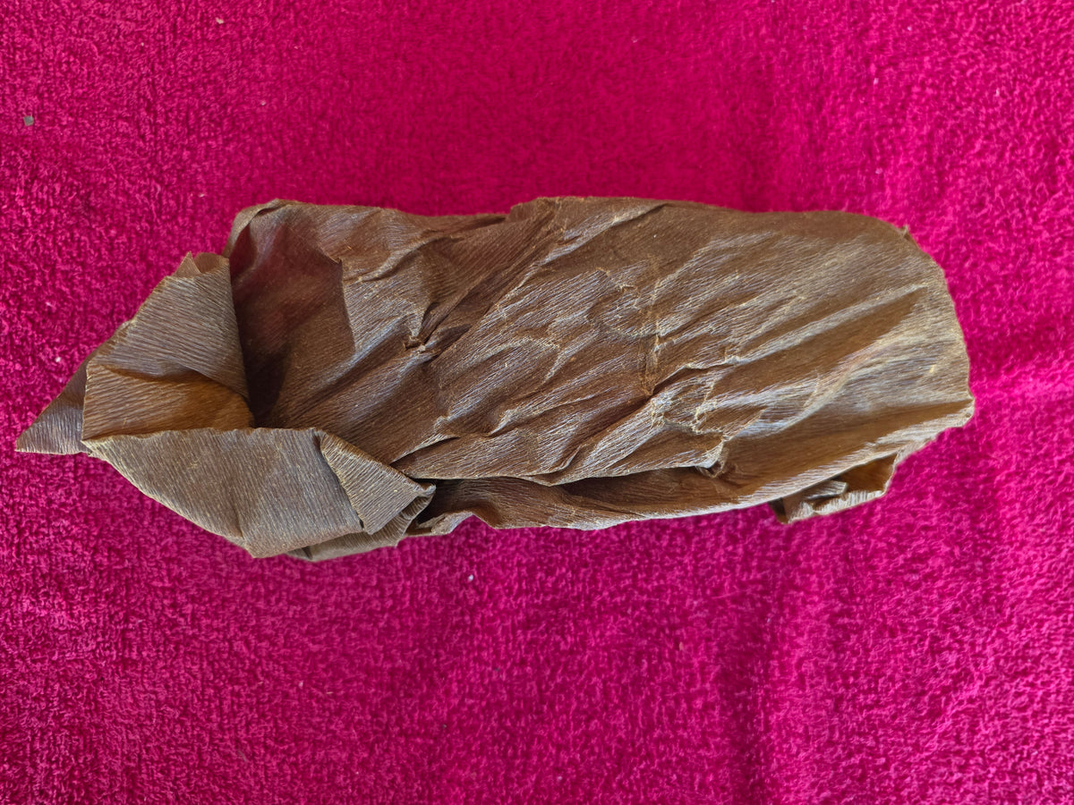 Fuel pump stand in its original oiled wrapper as found inside the carton