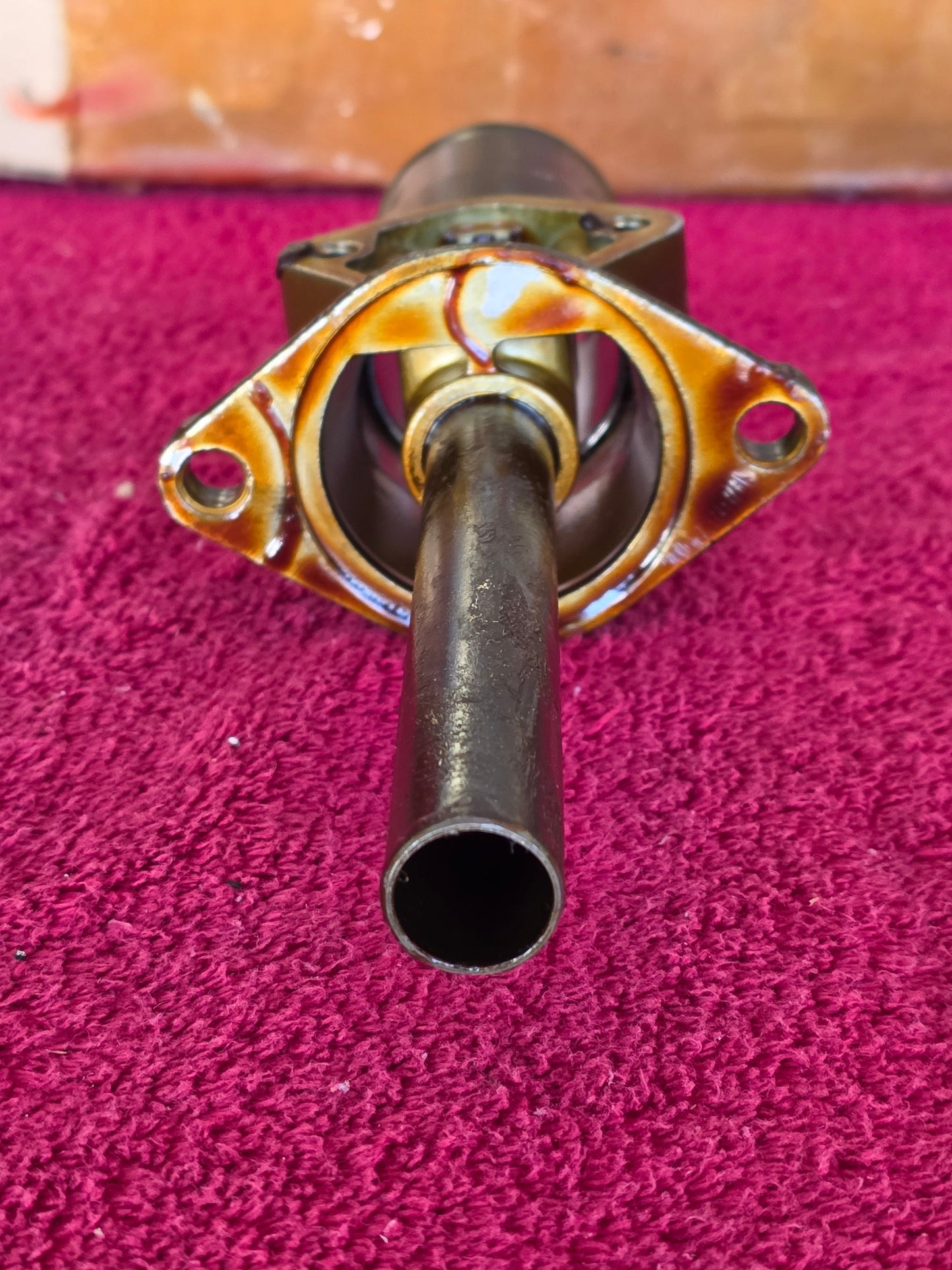End view down the oil control sleeve into the flange bore of the fuel pump stand