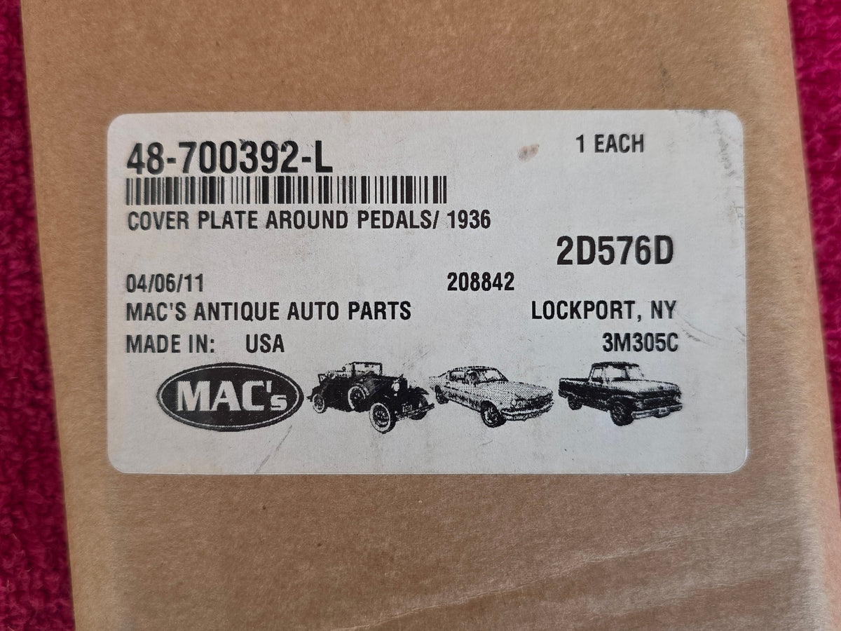 Close view of the box label reading 48-700392-L, COVER PLATE AROUND PEDALS 1936, Mac's Antique Auto Parts, Lockport NY, made in USA