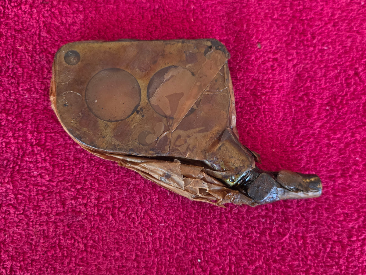 Columbia two-speed axle vacuum plate sealed in its original oiled wrapper, showing the two carburetor bores