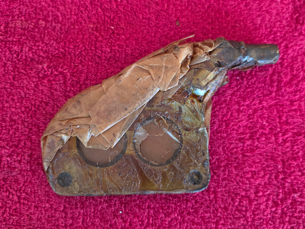 Reverse of the Columbia vacuum plate showing the vacuum takeoff nipple and corner mounting holes