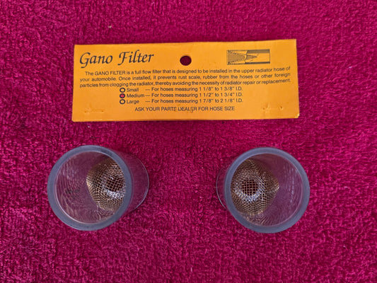Back of the Gano header card with the small, medium and large hose size chart, and both filters showing the copper alloy screens