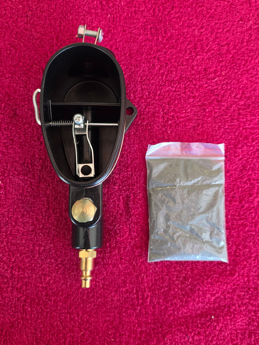Spark plug cleaner front showing the rubber plug seat, trigger, bag clamp and brass quick-connect nipple