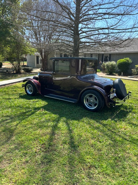 1926 Dodge coupe rear three-quarter on grass - rear-mounted spare tire, fenders and running boards retained, Race Star wheels