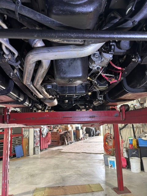 Underside on a lift - 5.2 Magnum oil pan, exhaust and steering box
