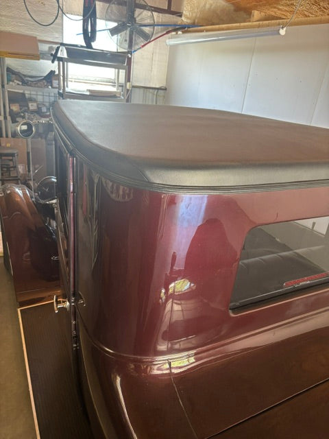 New black top and rear quarter in Kia Telluride Sangria maroon