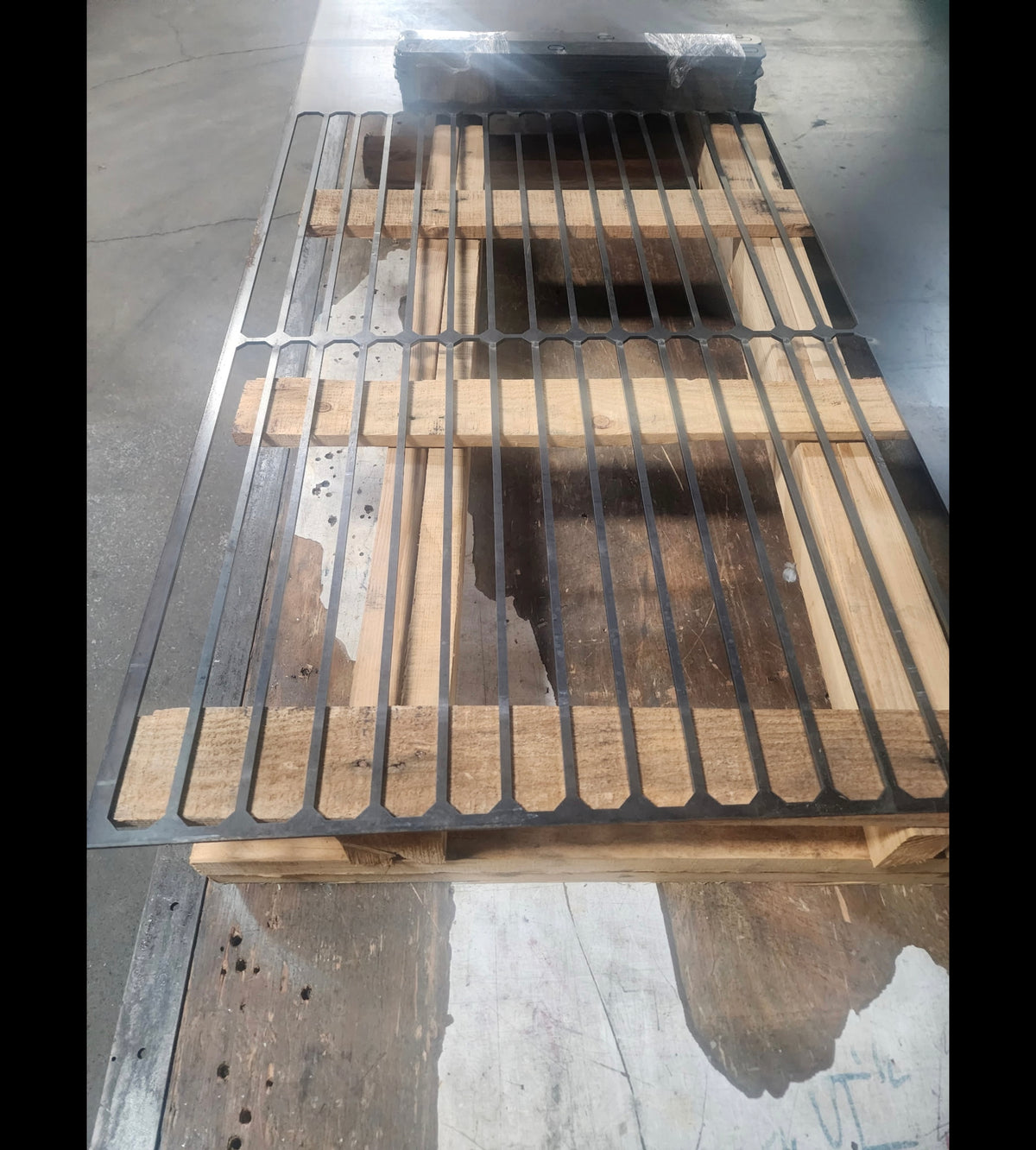Bracket blanks cut from the sheet of 1/4 in. plate