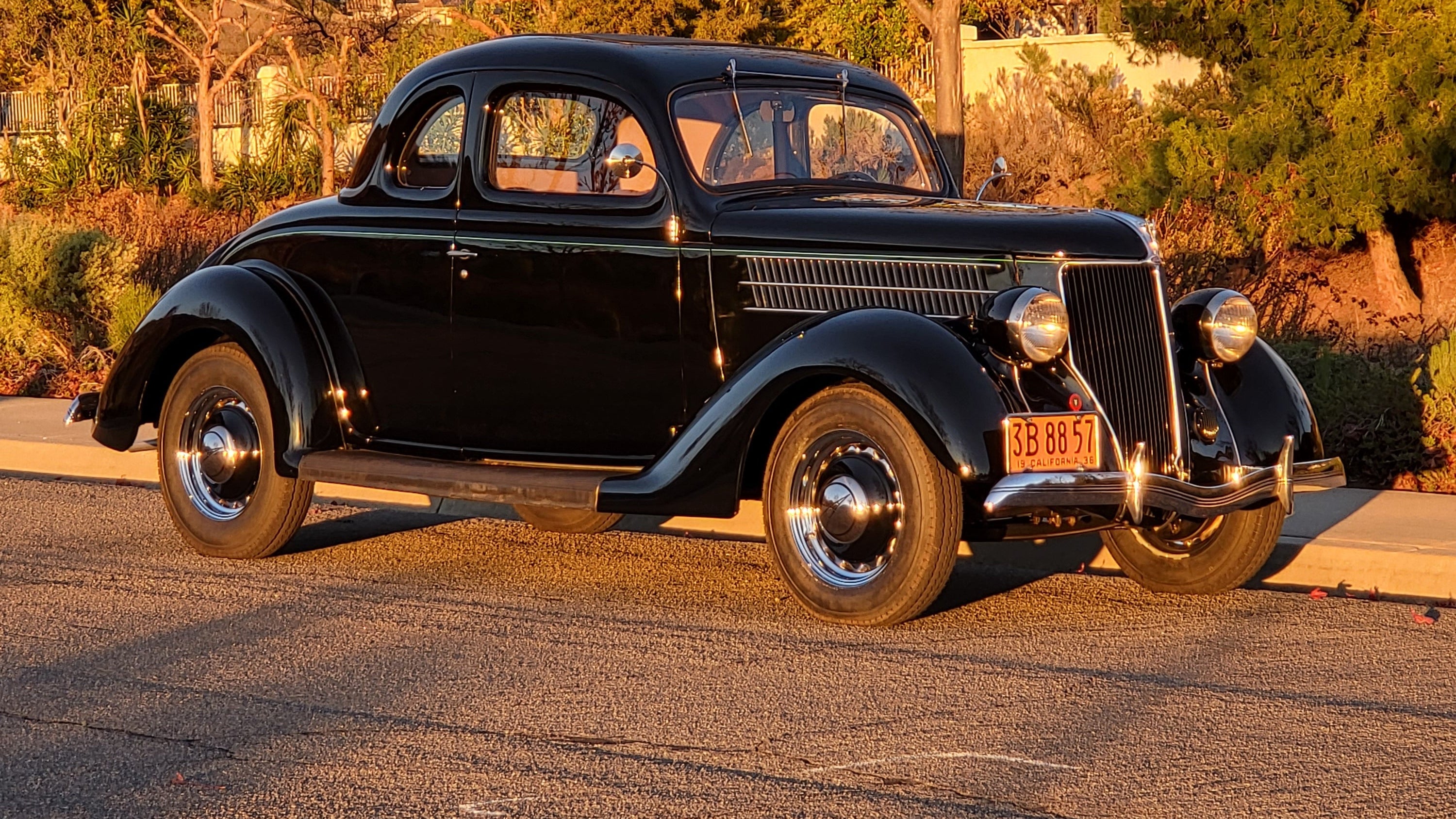 1936 Ford Coupe hot rod, black, parked at sunset — Flat Broke Speed